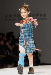 A child model parades the latest in children's fashion