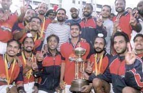 Punjab Police players with the Nehru Hockey trophy in the Capital