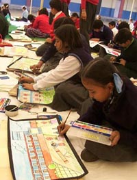 Students take part in a painting competition at Shivalikwala Doon School