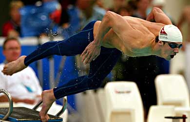 Michael Phelps of the US leaves the starting block in the men's middle distance freestyle event at the Sydney Skins Swimming tournament in Sydney on Wednesday