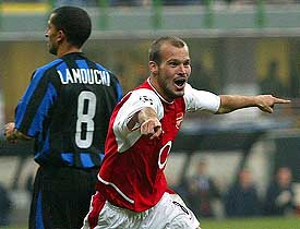 Arsenal Fredrik Ljungberg celebrates after scoring against Inter Milan during their Champions League Group B first stage match in Milan on Tuesday