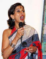 Eminent author Shobha De speaks at Sundaram Tagore Gallery at a reception to unveil a new haute couture fall fashion preview of designer Satya Paul in Manhattan on Tuesday