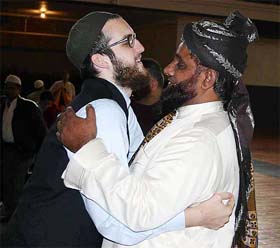 Muslims in North America  greet each other after offering prayer on the occasion of Id in New Jersey 