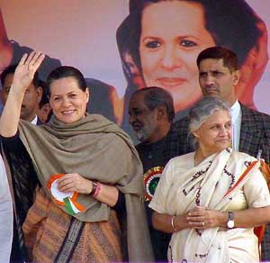 Congress President Sonia Gandhi with Delhi Chief Minister Sheila Dikshit at an election rally in Delhi on Thursday.