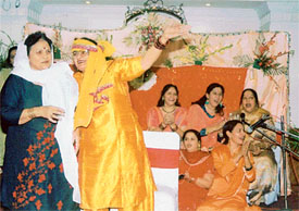 Members of Sur Sangam present a musical skit