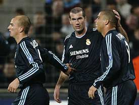 Real Madrid's Zinedine Zidane congratulates Ronaldo after he scored against Olympique Marseille during their Champions League Group F match in Marseille