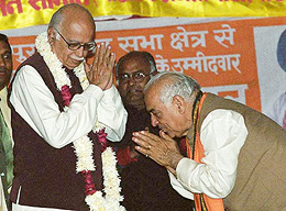 Deputy Prime Minister L.K. Advani being greeted by Delhi BJP President Madan Lal Khurana at an election rally in New Delhi.