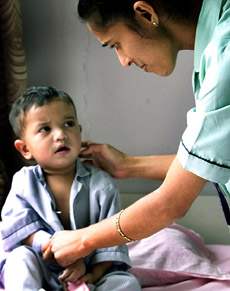 Pakistani boy Saadullaha is being examined for heart diseases by a doctor in Bangalore 