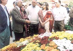 Delhi Lt-Governor Vijai Kapoor inaugurating a Chrysanthemum Show at Dilli Haat in the Capital