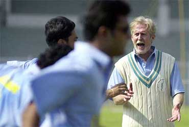 Actor Tom Alter gestures as he plays the role of the coach of the Indian cricket team at the muhurat of the film Silence Please...The Dressing Room at the Brabourne stadium in Mumbai