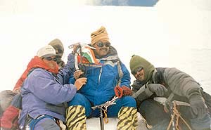 The team on the top of Lampak-II peak with the National and Punjab Police flags