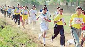 Students of ICSE schools of Chandigarh and nearby areas take part in a cross-country race at Ferozepur Bangar village, Mullanpur, Ropar district