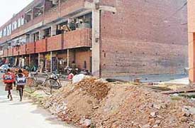 Malba dumped on a road in Sector 22 in Chandigarh.