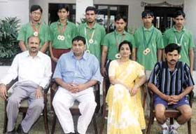 Ganga School principal H Srow and manager Sushil Kumar Gupta with the athletes of the school who won gold medals in the Zonal Athletic Championship