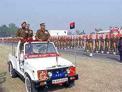 The Additional Director-General of the Border Security Force, Mr A.K. Mitra, inspects a guard of honour
