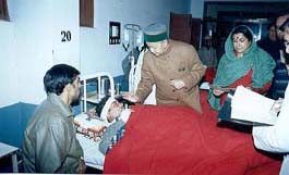 Chief Minister Virbhadra Singh enquires about the health of an accident victim, who was injured in Tuesdays HRTC bus mishap