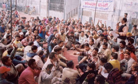 Members of the Sangharsh Committee, Municipal Corporation, stage a dharna in front of the MC building 