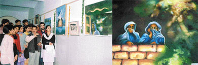 Akram Khan, an artist from Jammu, shows some of his collections to the students at the old DMC 