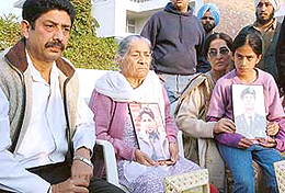 Uday Singhs father, Lt-Col P.M. Singh (left), grandmother Anup Kaur and sister Bani at their house in Sector 18 in Chandigarh on Thursday.