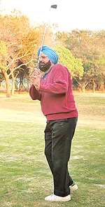 Raja Malvinder Singh, president of Chandigarh Golf Club, tees off to inaugurate Champions Chipping and Putting Range at Chandigarh Golf Club on Thursday.