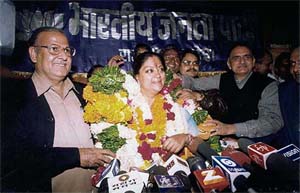 Rajasthan BJP chief Vasundra Raje being garlanded in Jaipur on Thursday following BJP's victory in the state Assembly election.