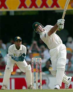 Australia's Ricky Ponting hits a six off the bowling of Harbhajan Singh 