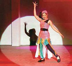 A student of the National Institute of Fashion Design, Sector 8, Chandigarh, performs during the annual awards and cultural extravaganza at Kala Gram, near Mani Majra, on Sunday.