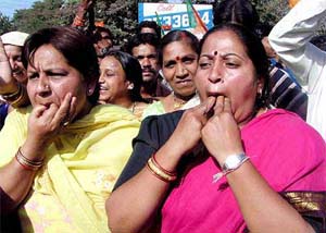 BJP supporters celebrate the partys victory at Indore in Madhya Pradesh