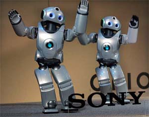 Sony Corp's humanoid robots dance at an unveiling in Tokyo