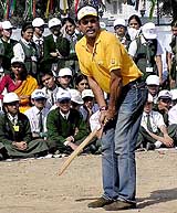 Former Indian cricket captain Kapil Dev shows his skills 