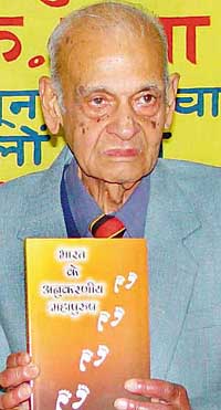 Dr Sansar Chandra with his book that was released in Chandigarh