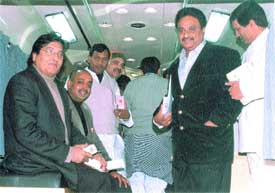 Union Ministers Vinod Khanna and Vijay Goel inside a mobile medical clinic in the Capital