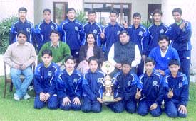 The Ganga School team which won the All-India CBSE National Hockey Tournament with school principal H Sraw and manager S. K. Gupta at a felicitation function