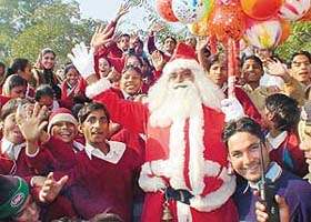 Santa distributes fun among the physically challenged children