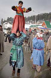 Kashmiri folk dancers entertain locals and tourists at Gulmarg
