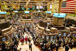 Traders work on the floor of New York Stock Exchange on Tuesday