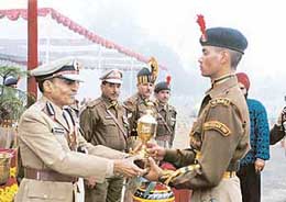 The Director-General, ITBP, Mr R.C. Aggarwal, hands over the award for best trainee to CT/GD Ravinder Sharma at the Bhanu Training Centre, ITBP, at Bhanu.