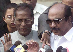 MDMK ministers Gingee N. Ramachandran and M. Kannappan talk to mediapersons outside the Prime Ministers residence