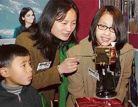 Delegates go around the Kalpana Chawla stall at the Science for Schoolchildren exhibition