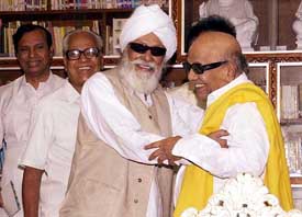 CPM general secretary Harkishan Singh Surjeet with DMK president M. Karunanidhi in Chennai on Saturday.