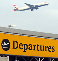 A British Airways plane takes off at Heathrow Airport