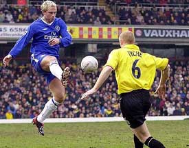 Chelseas Eidur Gudjohnsen fights for the ball with Watfords Sean Dyche 