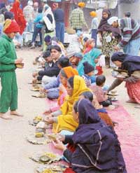 Langar being served to mark the birth anniversary of Guru Gobind Singh at Sector 30 gurdwara 