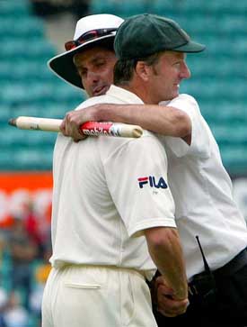 Australian captain Steve Waugh is hugged by umpire Billy Bowden from New Zealand 