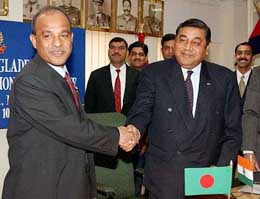 The Director General of Border Security Force, Ajay Raj Sharma, shakes hands with his Bangladeshi counterpart