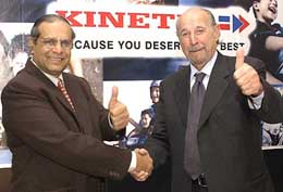 Kinetic chairman Arun Firodia greets Leopoldo Tartirini, founder of Italjet, in Mumbai to announce an alliance