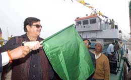 Union Shipping Minister Shatrughan Sinha flags off an inland water transport cargo vessel at Ganga Corridor