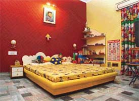 The childrens room is bright, but no jarring colours have been used