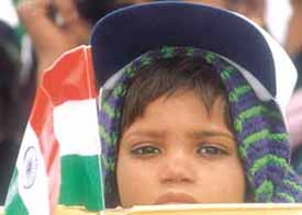 A school child taking a pledge to eliminate child labour at India Gate in the Capital
