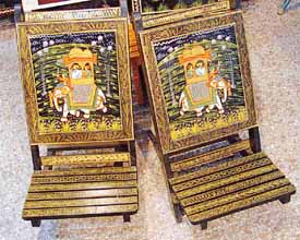 Painted wooden chairs on display at "Gurjari"', an exhibition-cum-sale, at Lajpat Rai Bhavan, in Chandigarh